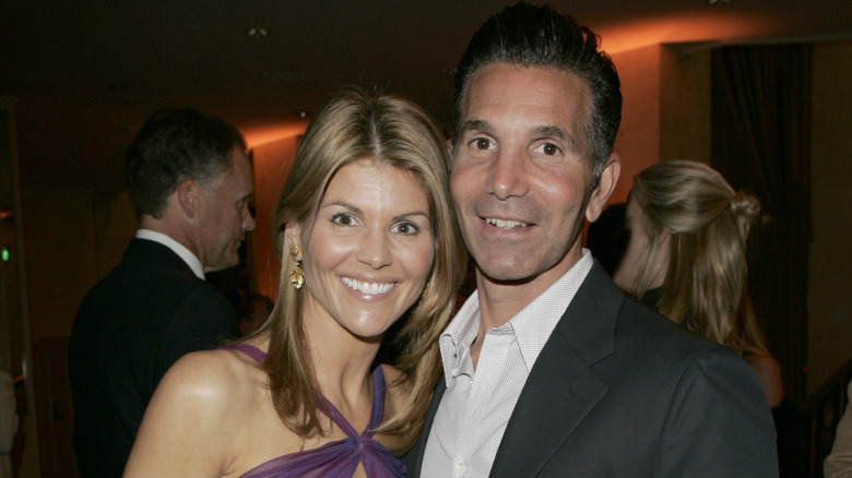 Lori Loughlin and Mossimo Giannulli pictured together at an event in Beverly Hills