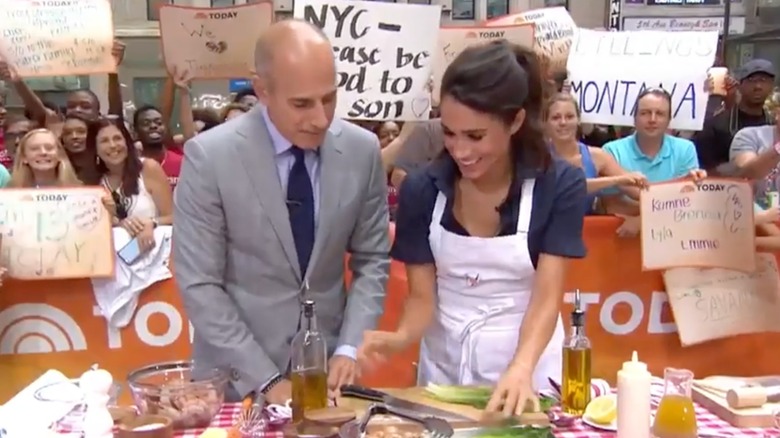 Matt Lauer and Meghan Markle cooking on the "Today" show in 2016