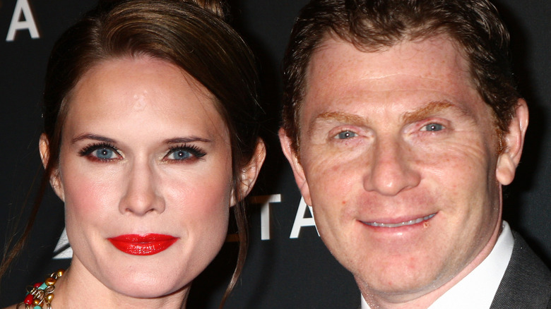 Bobby Flay smiling while posing with his ex-wife, Stephanie March