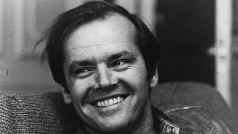 black and white photo of smiling Jack Nicholson in the '70s