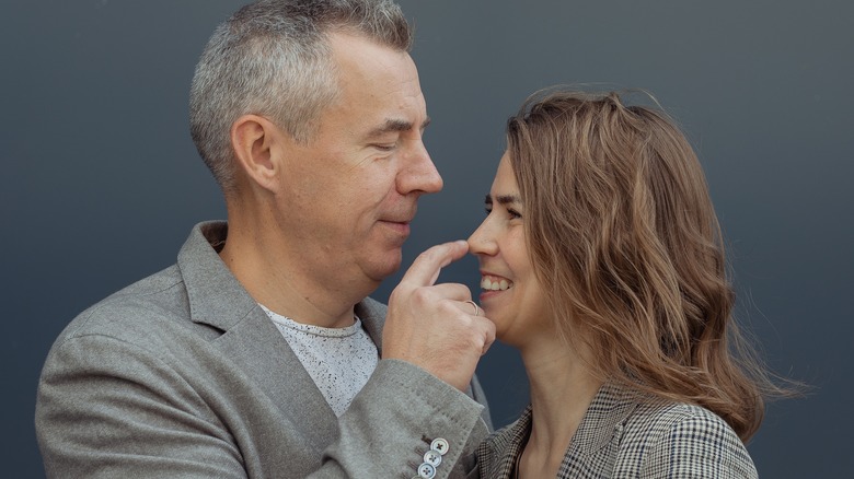 Couple with age gap sharing smiles