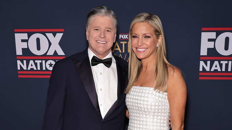 Ainsley Earhardt and Sean Hannity posing together