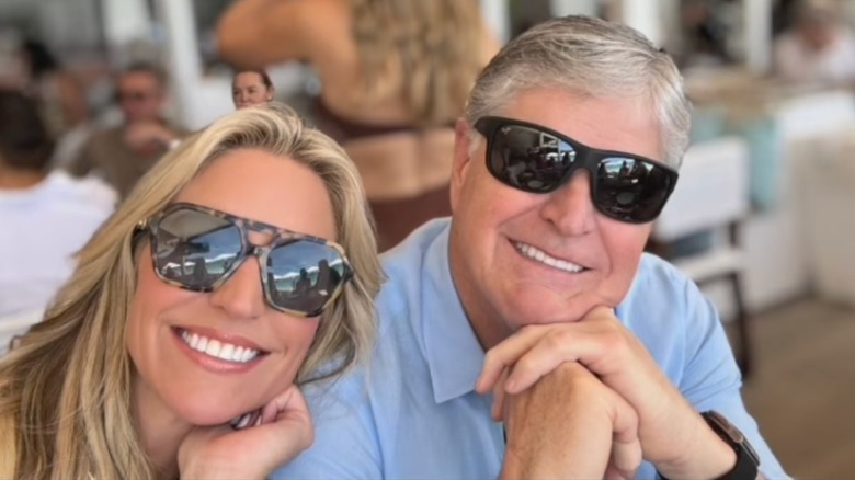 Ainsley Earhardt and Sean Hannity smiling