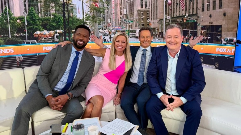 Brian Kilmeade, Ainsley Earhardt, Lawrence B. Jones, and Piers Morgan smiling