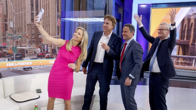 Ainsley Earhardt, Kevin Nealon, Brian Kilmeade, and Steve Doocy take a selfie together (2025)
