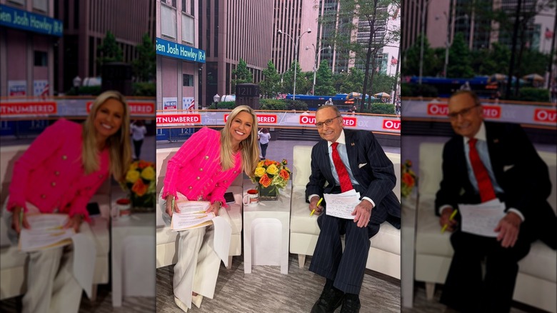 Ainsley Earhardt smiling in a pink blazer and a pair of white pants next to her co-host who's wearing a pinstriped suit and a red tie.