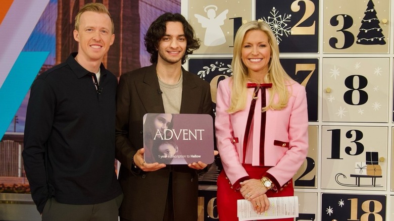 Ainsley Earhardt smiling with two other people