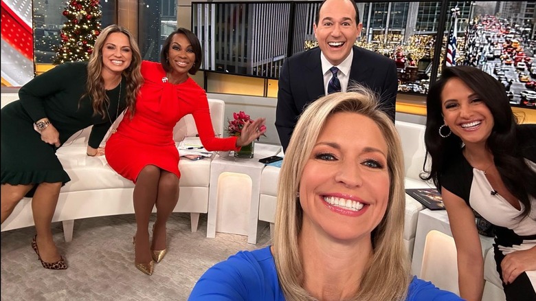 Ainsley Earhardt taking a selfie with Fox News hosts.
