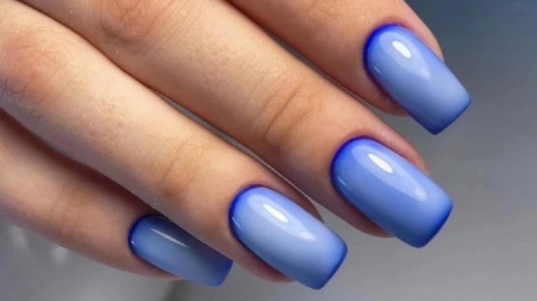 Blue airbrushed nails
