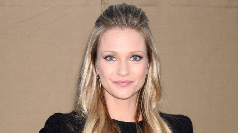 AJ Cook at event
