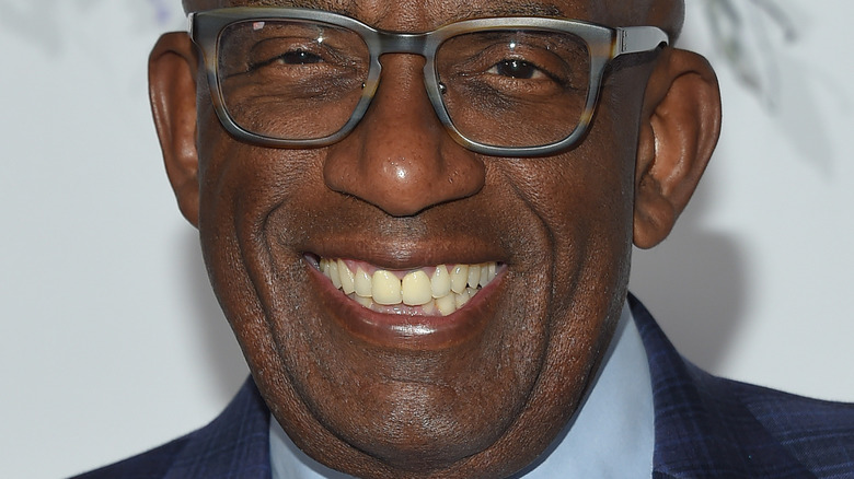 Al Roker wearing glasses and smiling