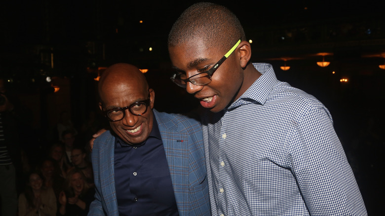 Al Roker smiling with his son, Nick