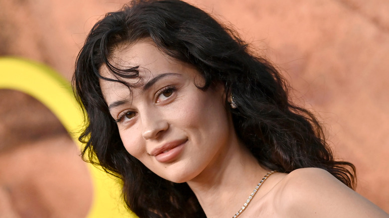 Close-up of Alexa Demie smiling on the red carpet