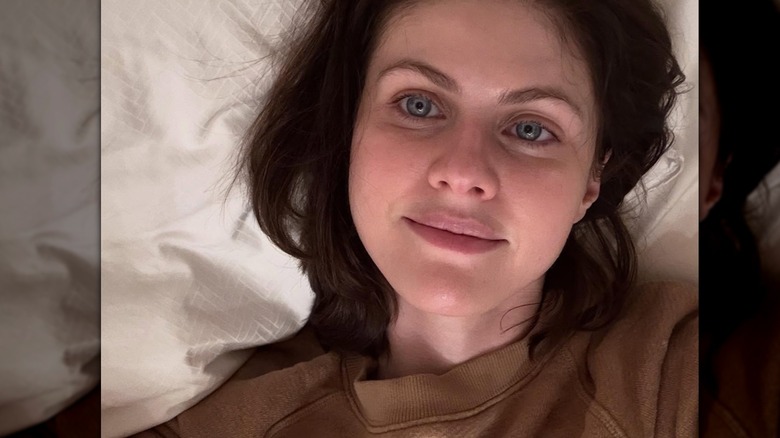 Alexandra Daddario posing in a selfie without makeup on