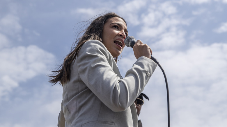 Alexandria Ocasio-Cortez giving a speech to the public