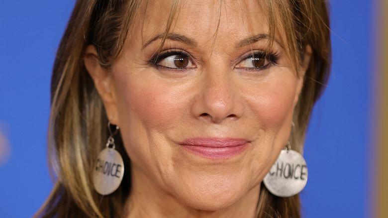 Nancy Lee Grahn smirking