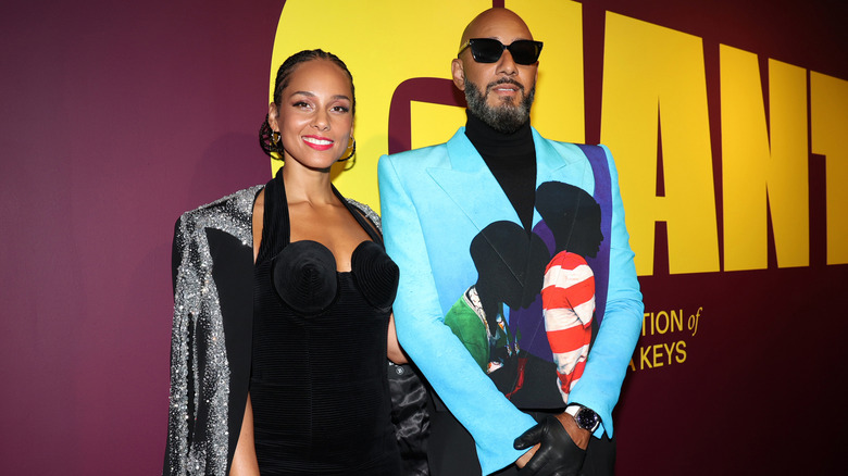 Alicia Keys and Swizz Beatz smiling