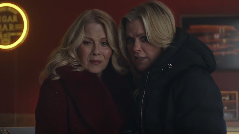 Alison Sweeney and Barbara Niven huddled together in coats looking scared