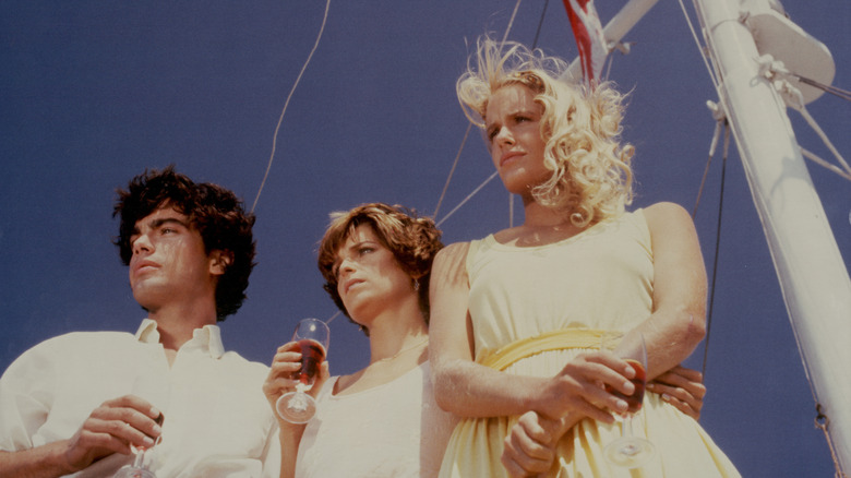 Daryl Hannah on set in a dress on a boat