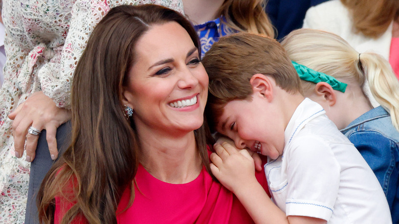 Kate Middleton holding Prince Louis