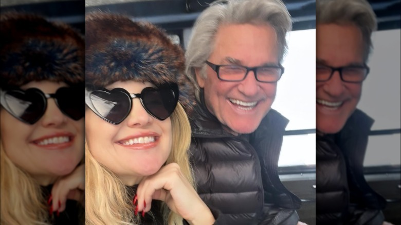 Selfie of Kate Hudson in sunglasses and Kurt Russell in glasses, both smiling