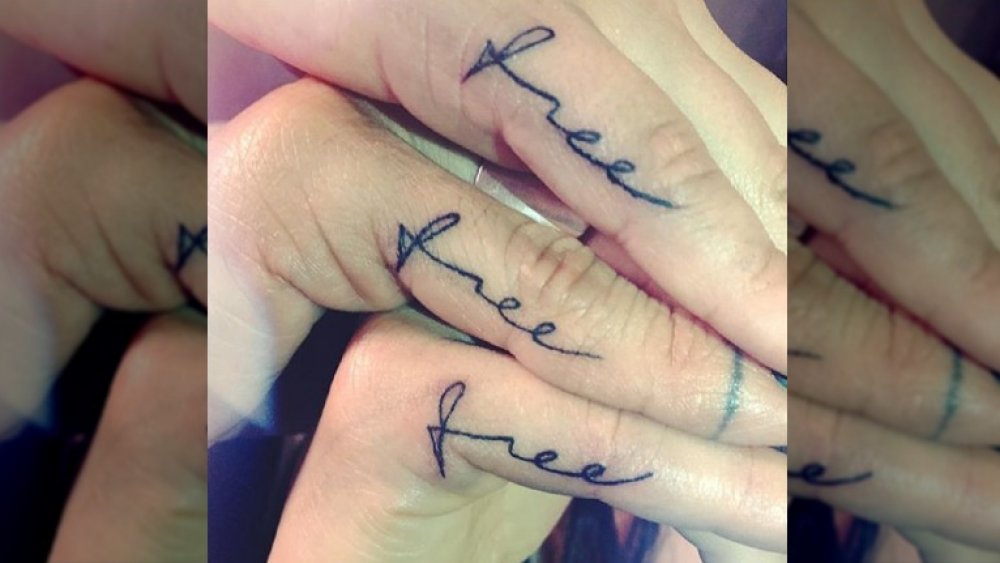 Demi Lovato's "free" tattoo along with her friends' "free" tattoos