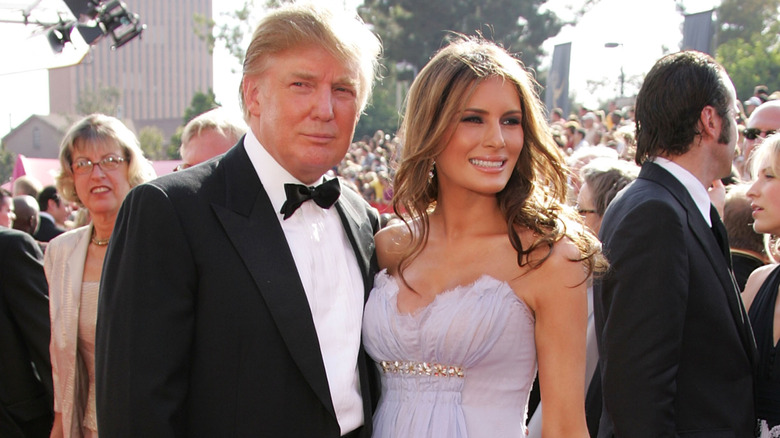 Donald Trump and Melania Trump posing on the red carpet