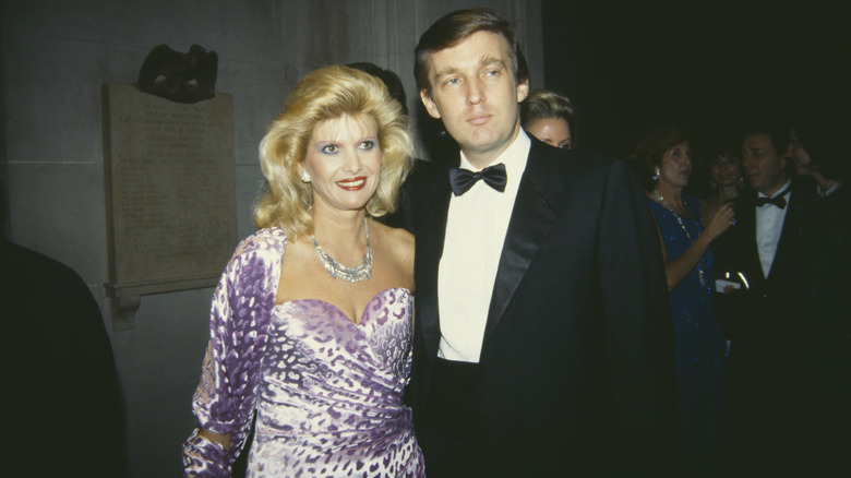 A young Donald Trump and Ivana Trump posing for a photo at formal event