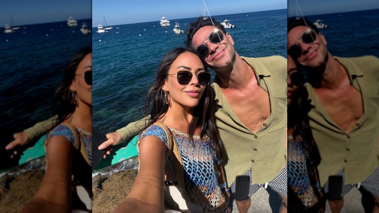 Janel Parrish and Sasha Farber taking an oceanside selfie.