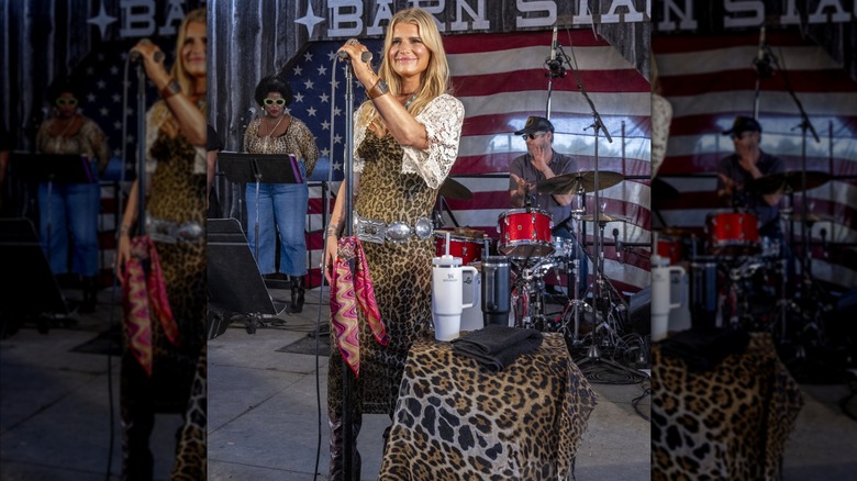 Jessica Simpson performing in a leopard-print dress.