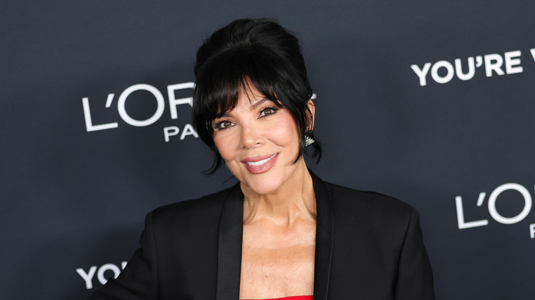 Kris Jenner red top black suit jacket