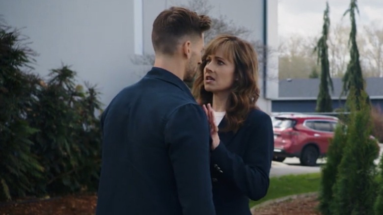 Nikki DeLoach (right) in "Curious Caterer: Fatal Vows"