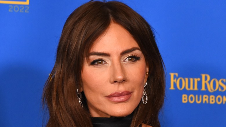 Krista Allen smirking