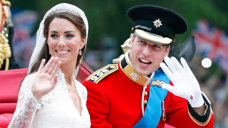 Princess Catherine and Prince William waving on their wedding day