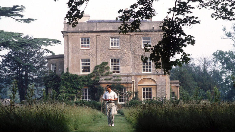 The then-Prince Charles in the grounds of his home, Highgrove House, in Tetbury, Gloucestershire
