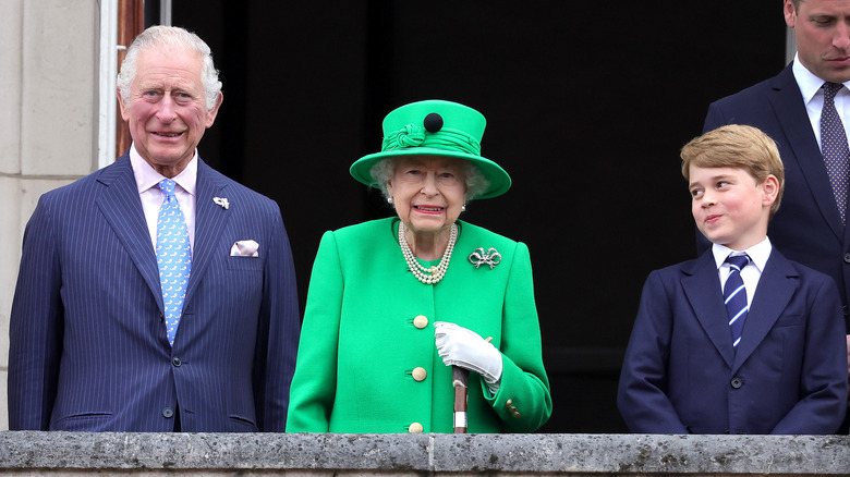 King Charles III Queen Elizabeth II and Prince George 