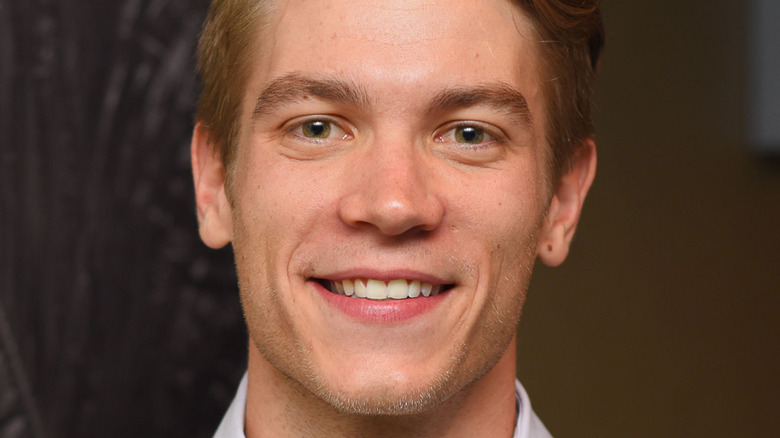 Lucas Adams smiles for a photo.