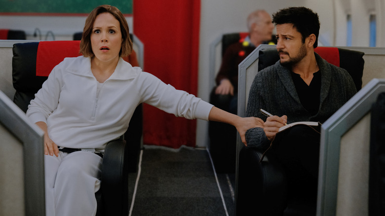 Erin Krakow grabbing Tyler Hynes' arm