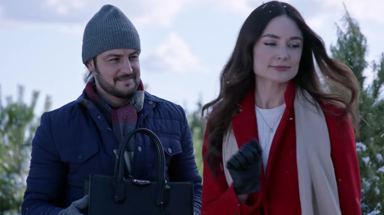 Tyler Hynes and Mallory Jansen in winter clothes