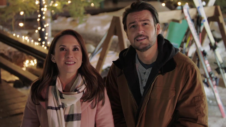 Lacey Chabert and Tyler Hynes acting in a scene.