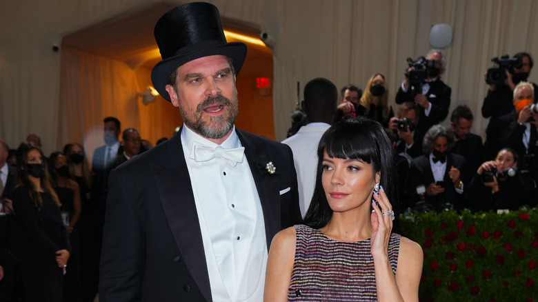 Lily Allen and David Harbour posing for photos in their finery