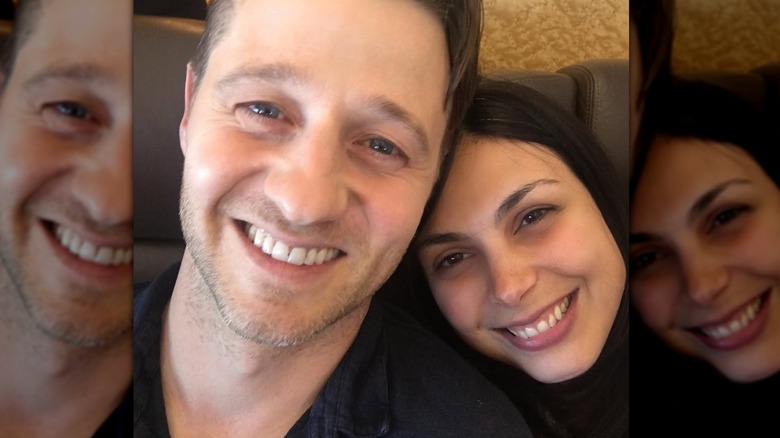 Morena Baccarin leans her head on Ben McKenzie's shoulder in a close-up selfie.