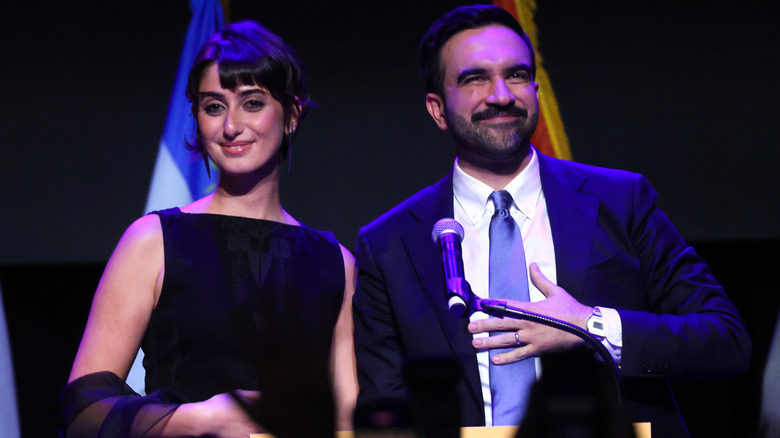 Rama Duwaji and Zohran Mamdani on stage after Mamdani's NYC mayoral election win