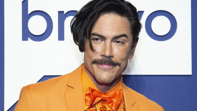 Tom Sandoval in orange suit