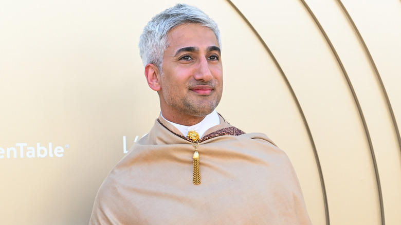 Tan France at an event