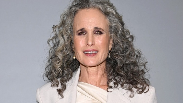 Andie MacDowell posing at event