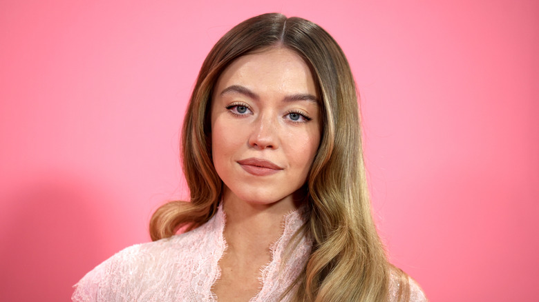 Sydney Sweeney in a pink top