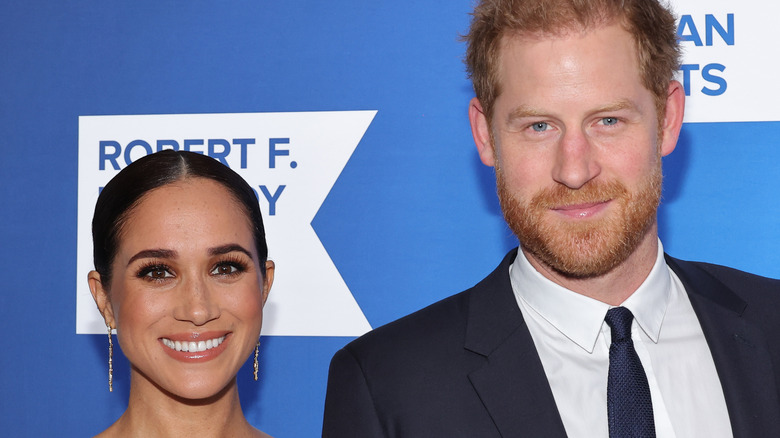 Meghan Markle and Prince Harry smiling 