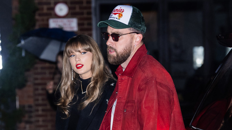 Taylor Swift and Travis Kelce walking together
