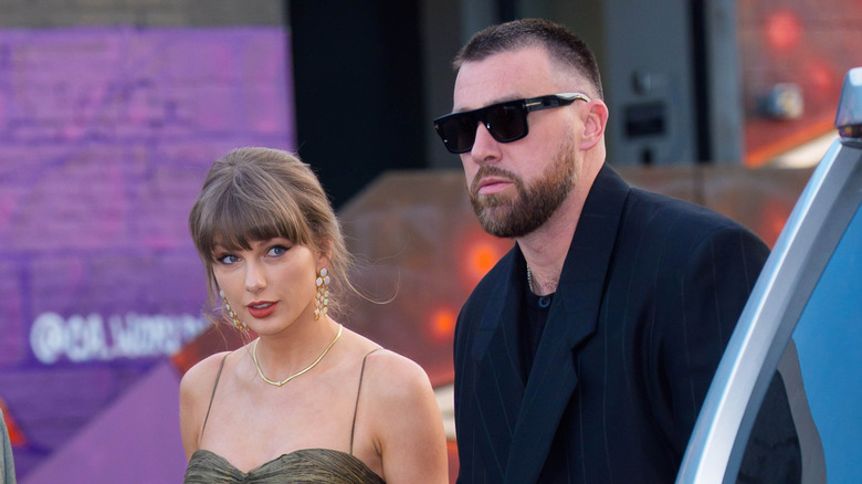 Taylor Swift and Travis Kelce walking together